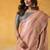 Peach tissue silk with beautiful tussle on pallu casual  wear saree