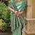 Green silk blend embroidered party wear Saree with blouse 