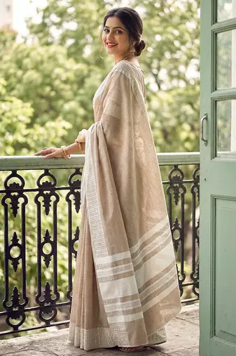 Beige colour linen saree with woven border & elegant pallu