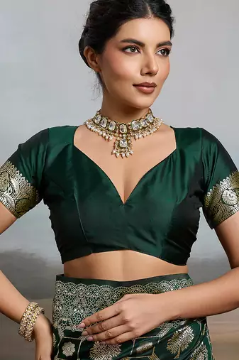 Green colour silk blend saree with silver zari weaving border