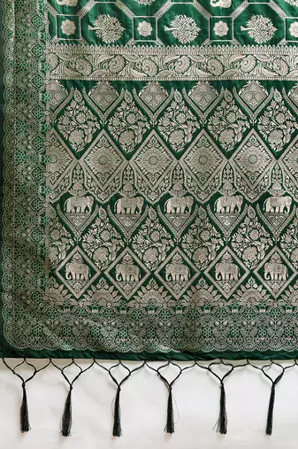 Green colour silk blend saree with silver zari weaving border