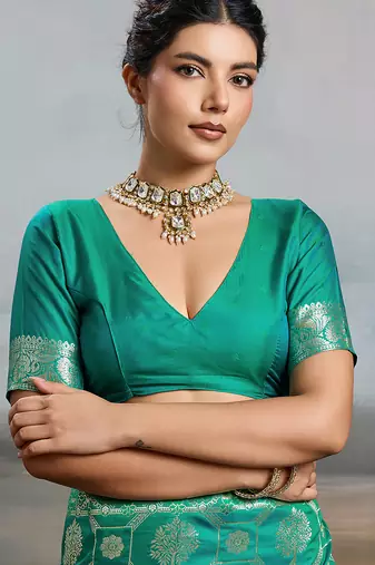 Green colour silk blend saree with silver zari weaving border