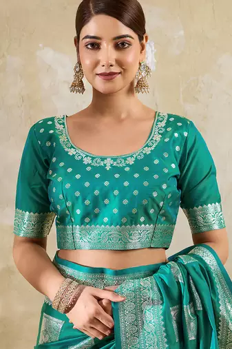 Sea green colour silk blend saree with silver zari weaving border