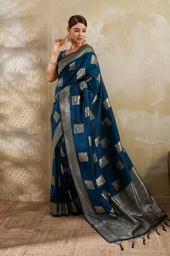 Teal blue colour silk blend saree with silver zari weaving border
