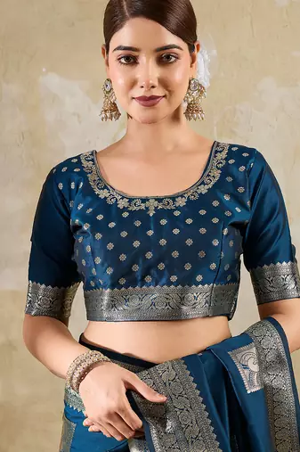 Teal blue colour silk blend saree with silver zari weaving border