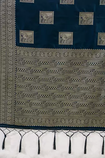 Teal blue colour silk blend saree with silver zari weaving border