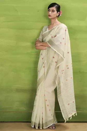 Off-white linen beautiful tussle on pallu casual wear saree