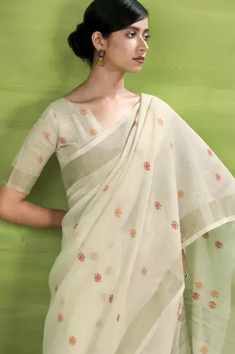 Off-white linen beautiful tussle on pallu casual wear saree