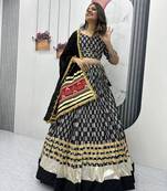 NAVRATRI  WEAR BLACK COLOR RAYON COTTON LUMPI LACE BORDER FLARED LEHENGA CHOLI SET FULL STITCHED.