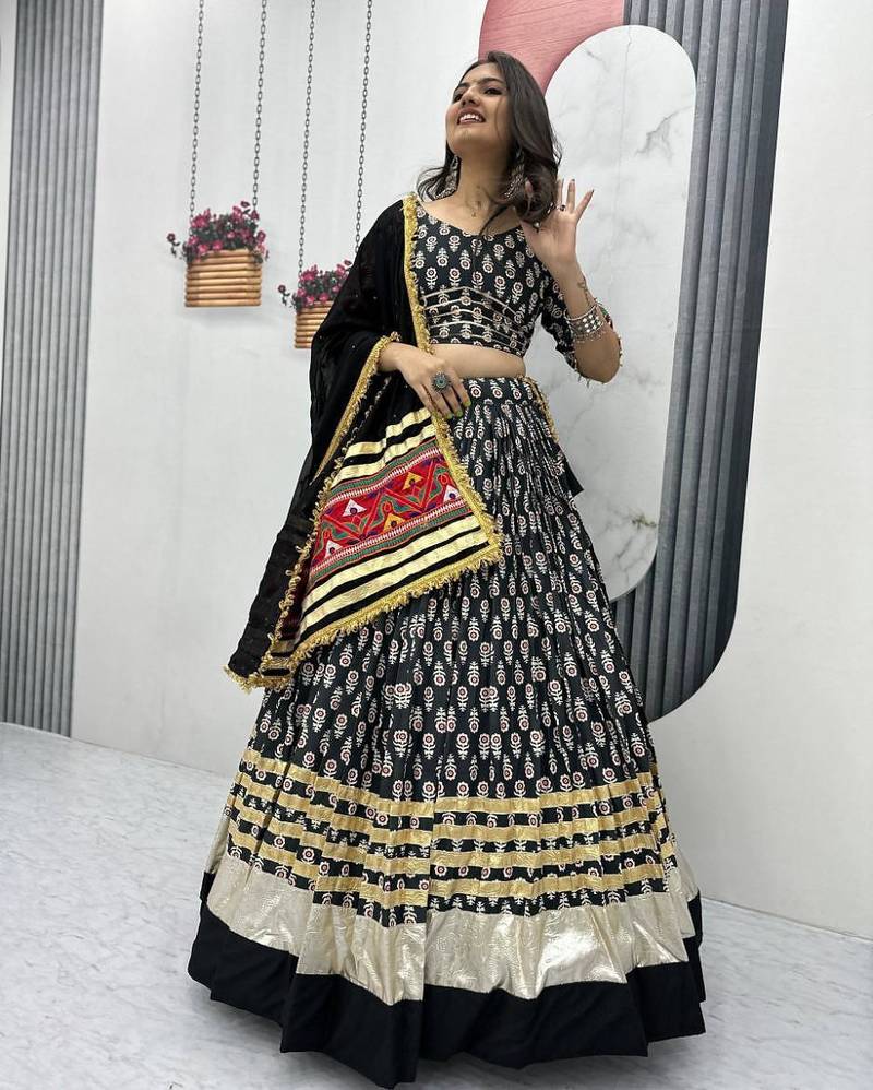 NAVRATRI  WEAR BLACK COLOR RAYON COTTON LUMPI LACE BORDER FLARED LEHENGA CHOLI SET FULL STITCHED.