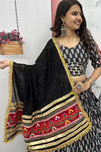 NAVRATRI WEAR BLACK RAYON COTTON LUMPI LACE BORDER FLARED LEHENGA CHOLI SET FULL STITCHED
