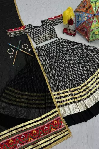 NAVRATRI WEAR BLACK RAYON COTTON LUMPI LACE BORDER FLARED LEHENGA CHOLI SET FULL STITCHED