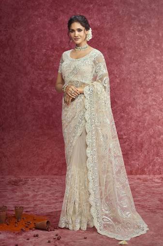 Off white net heavy designer sequins  & cut work border saree