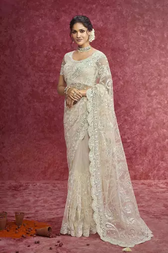 Off white net heavy designer sequins  & cut work border saree