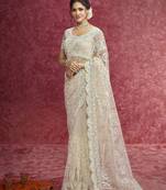 Off white net heavy designer sequins  & cut work border saree