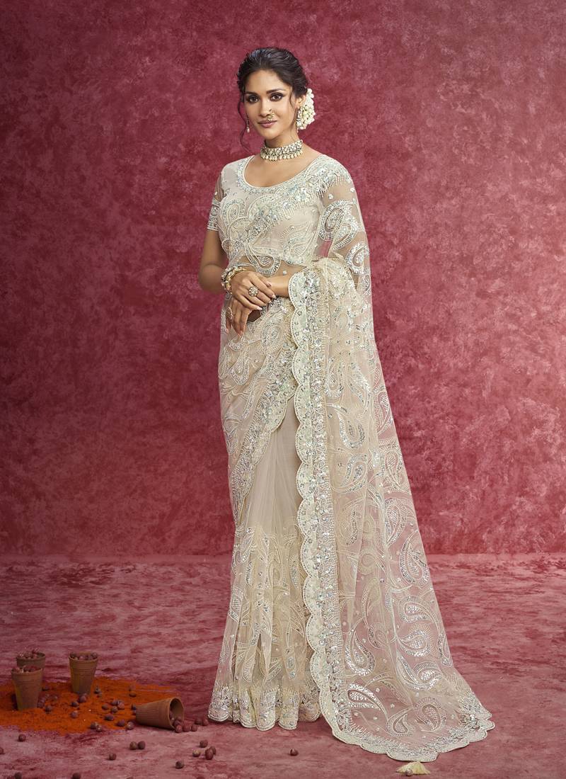 Off white net heavy designer sequins  & cut work border saree