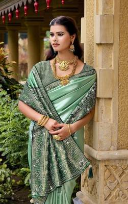 Green silk blend embroidered party wear Saree with blouse  2