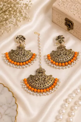 Orange accent traditional earrings & maang tikka
