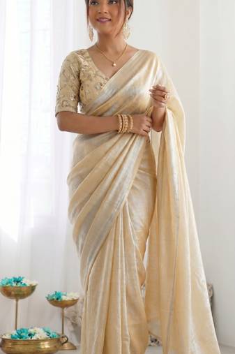 New trendy latest  cream shimmer saree with matching embroidered blouse