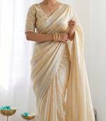 New trendy latest  cream shimmer saree with matching embroidered blouse