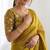 New trendy latest  gold shimmer saree with matching embroidered blouse
