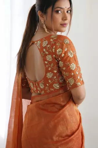 New trendy latest  orange shimmer saree with matching embroidered blouse