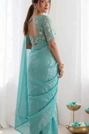 New trendy latest  turquoise shimmer saree with matching embroidered blouse