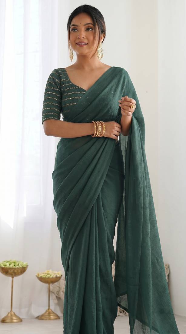 New trendy elegant dark bottle green solid saree with embellished blouse
