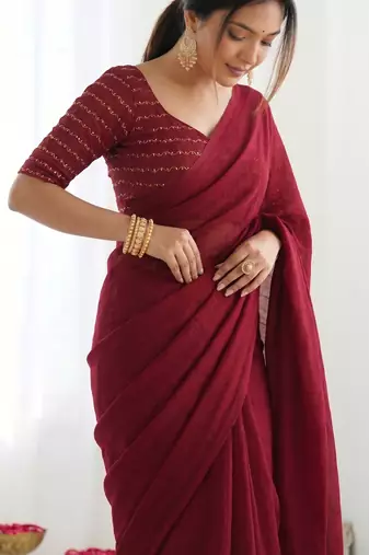 New trendy elegant blood red solid saree with embellished blouse