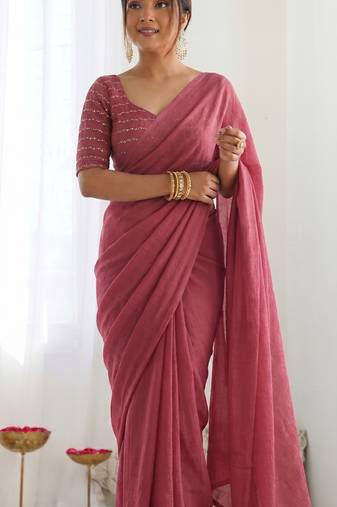 New trendy elegant peach solid saree with embellished blouse