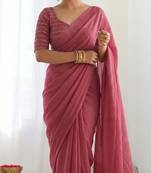 New trendy elegant peach solid saree with embellished blouse