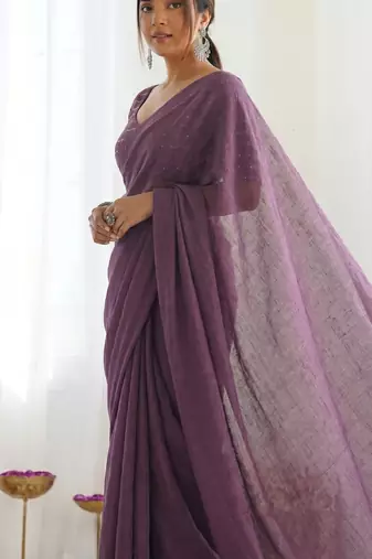 New trendy elegant purple solid saree with embellished blouse