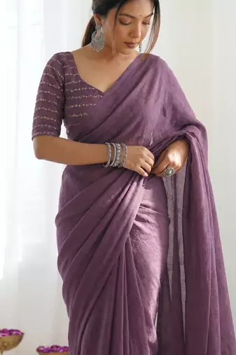 New trendy elegant purple solid saree with embellished blouse