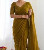 New trendy elegant gold solid saree with embellished blouse