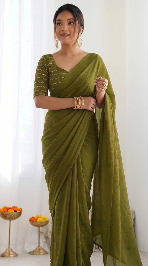 New trendy elegant mehendi solid saree with embellished blouse