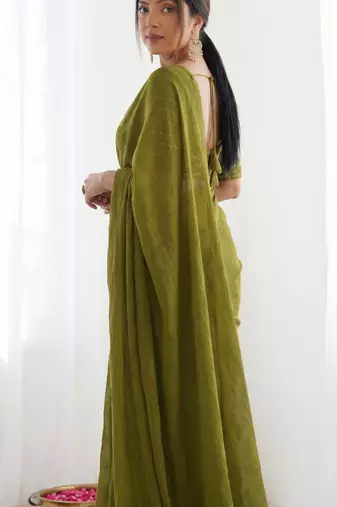 New trendy elegant mehendi solid saree with embellished blouse