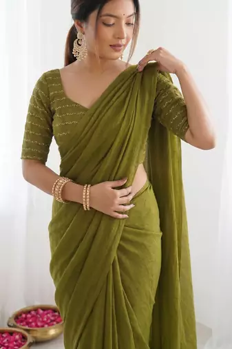 New trendy elegant mehendi solid saree with embellished blouse