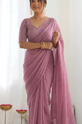 New trendy elegant baby pink solid saree with embellished blouse