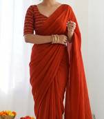New trendy elegant orange solid saree with embellished blouse