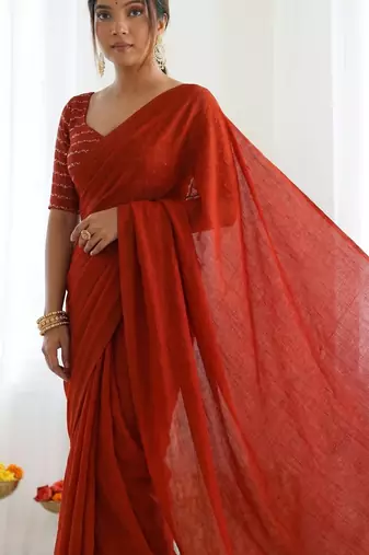 New trendy elegant orange solid saree with embellished blouse