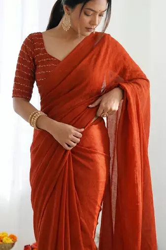New trendy elegant orange solid saree with embellished blouse
