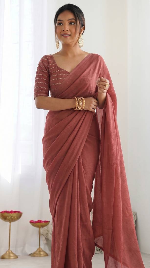 New trendy elegant raddish brown solid saree with embellished blouse