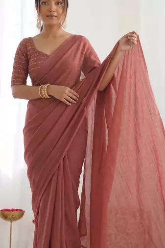 New trendy elegant raddish brown solid saree with embellished blouse