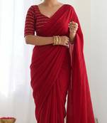 New trendy elegant red solid saree with embellished blouse