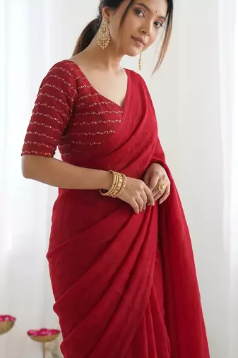 New trendy elegant red solid saree with embellished blouse
