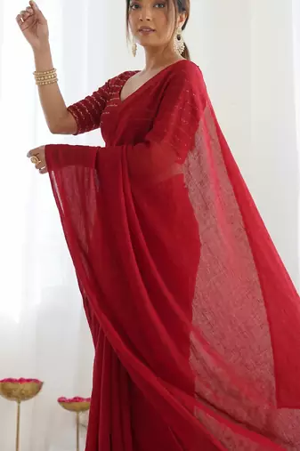 New trendy elegant red solid saree with embellished blouse