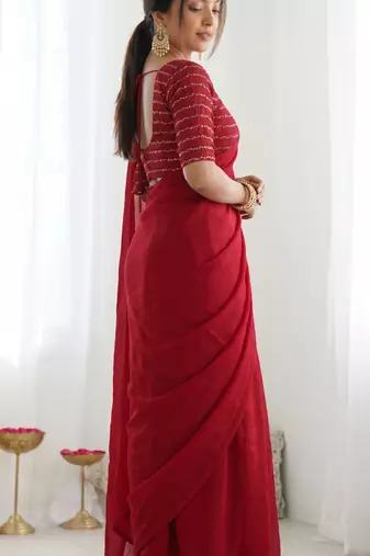 New trendy elegant red solid saree with embellished blouse