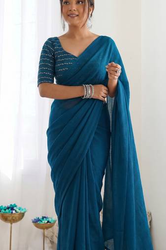 New trendy elegant teal solid saree with embellished blouse
