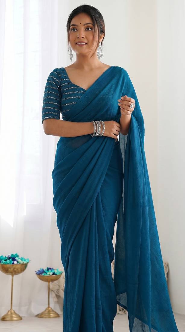 New trendy elegant teal solid saree with embellished blouse