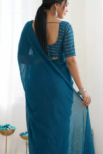 New trendy elegant teal solid saree with embellished blouse